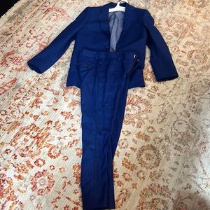 Boys suit. Jacket size 12, pants size 10.